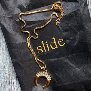 NWOT Gold Plated Crescent with Baguette Stones Necklace